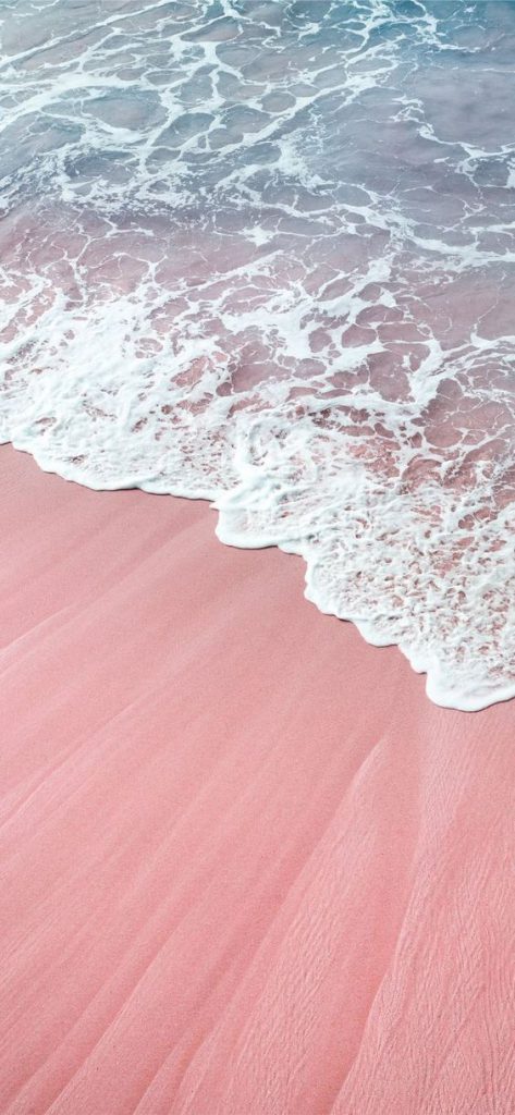 Hình nền cát biển màu hồng